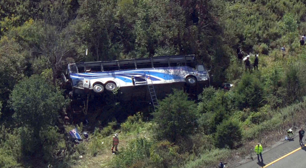 New York Student Bus Crash Kills 2, Injures 40.