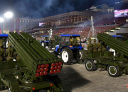 A Military Parade With Dump Trucks Converted Into Missile Launchers Hailed North Korea’s Birth.