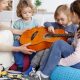 Guitar Classes for Kids: Developing Discipline and Motor Skills